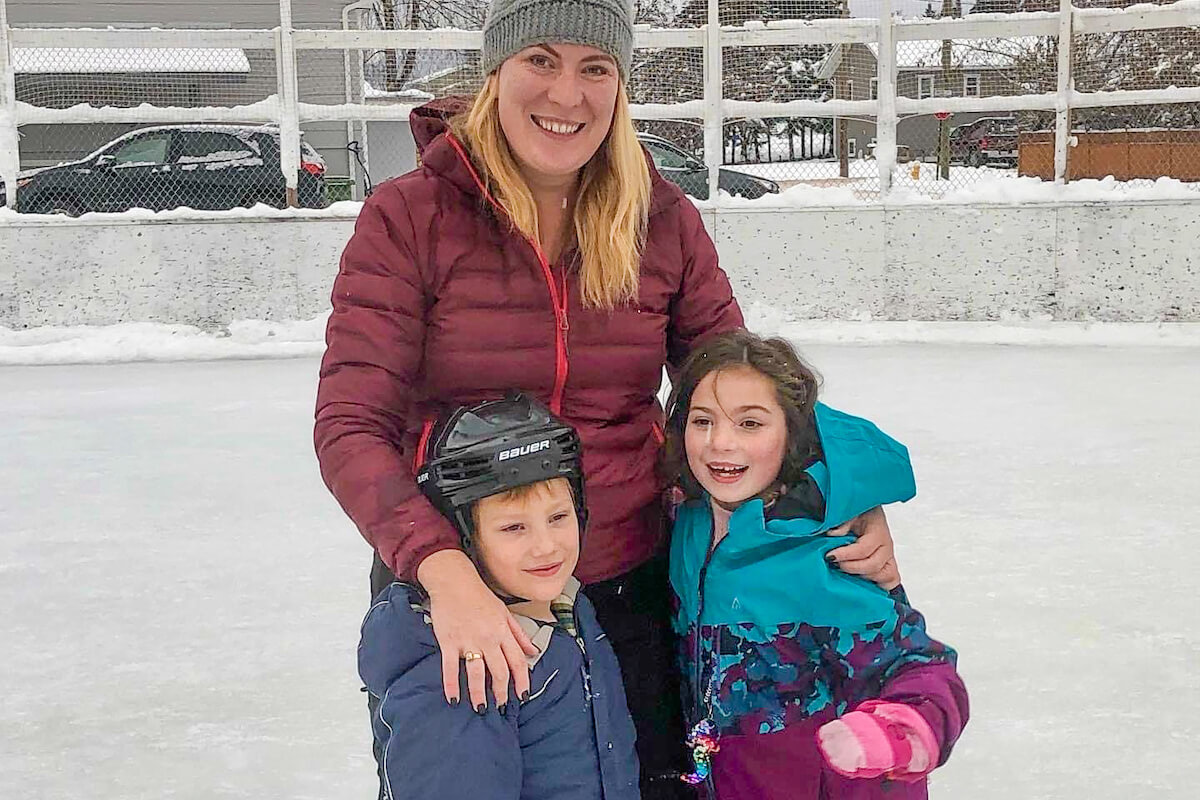Rebecca Sketchley with children ice skating - Royal Roads University scholarship recipient