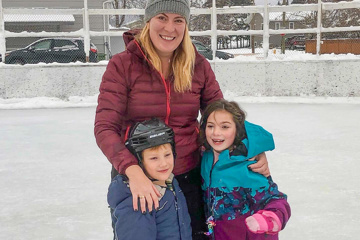 Rebecca Sketchley with children ice skating - Royal Roads University scholarship recipient