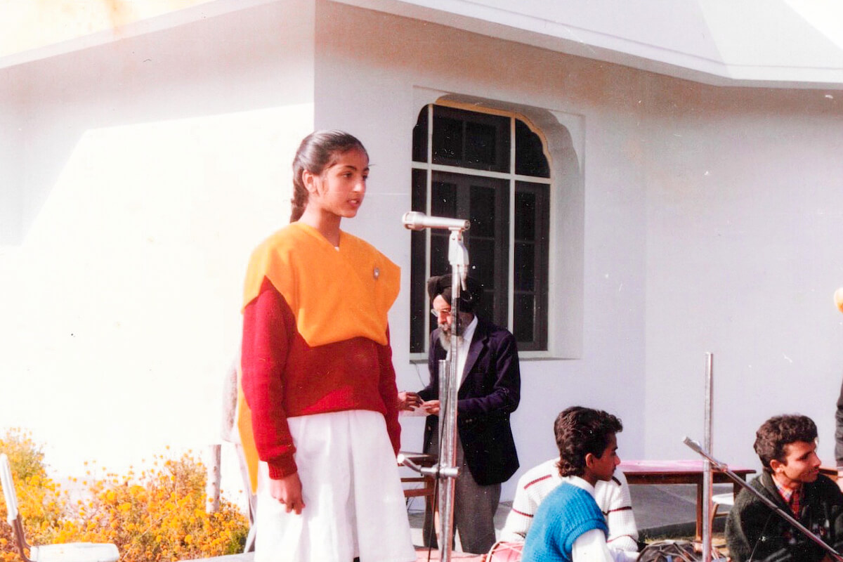 Pushpinder speaking at a school event in rural Punjab