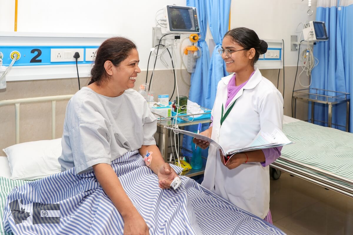 Savitri - GNM nursing bursary recipient practicum with patient at Guru Nanak College of Nursing in Punjab