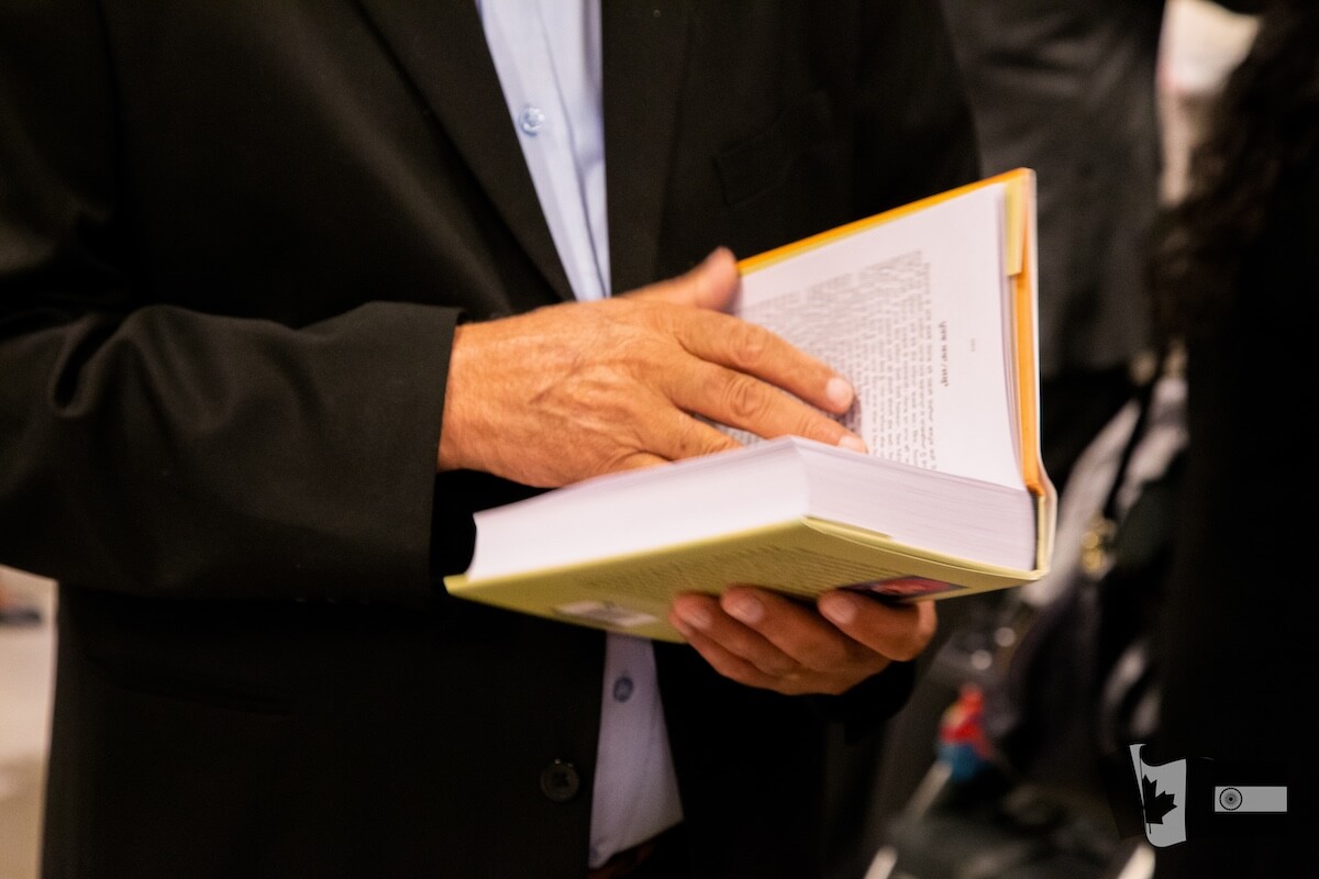 Dhahan Prize - holding book open