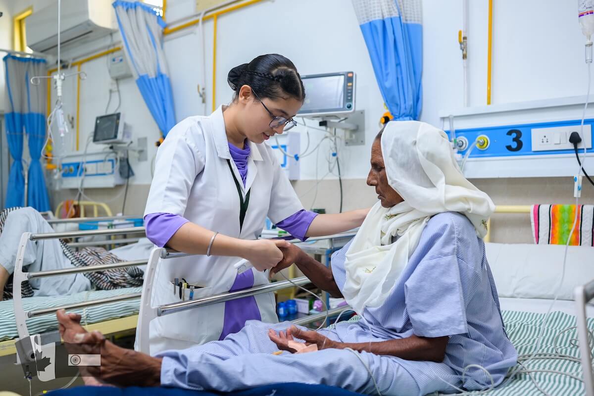Harjot Kaur - charitable bursary recipient - nursing student caring for patient