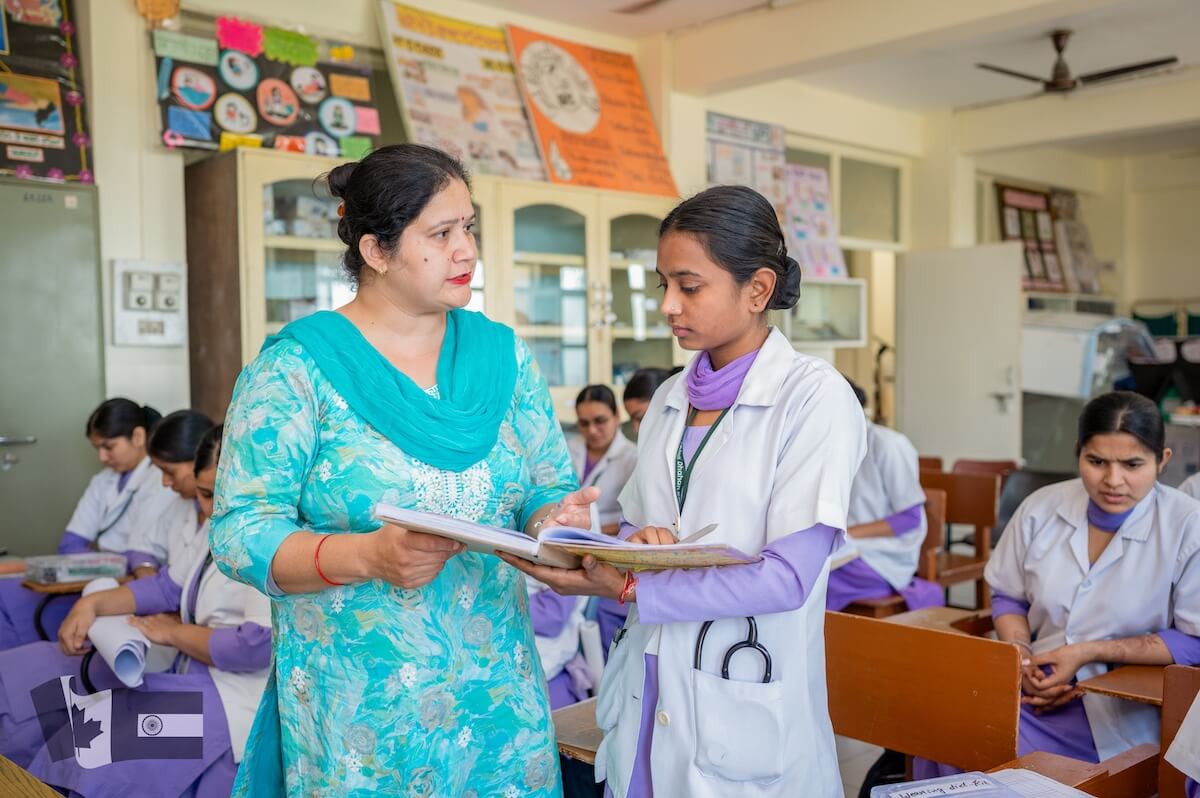 Raj Nandni - bursary recipient at Guru Nanak College of Nursing with teacher