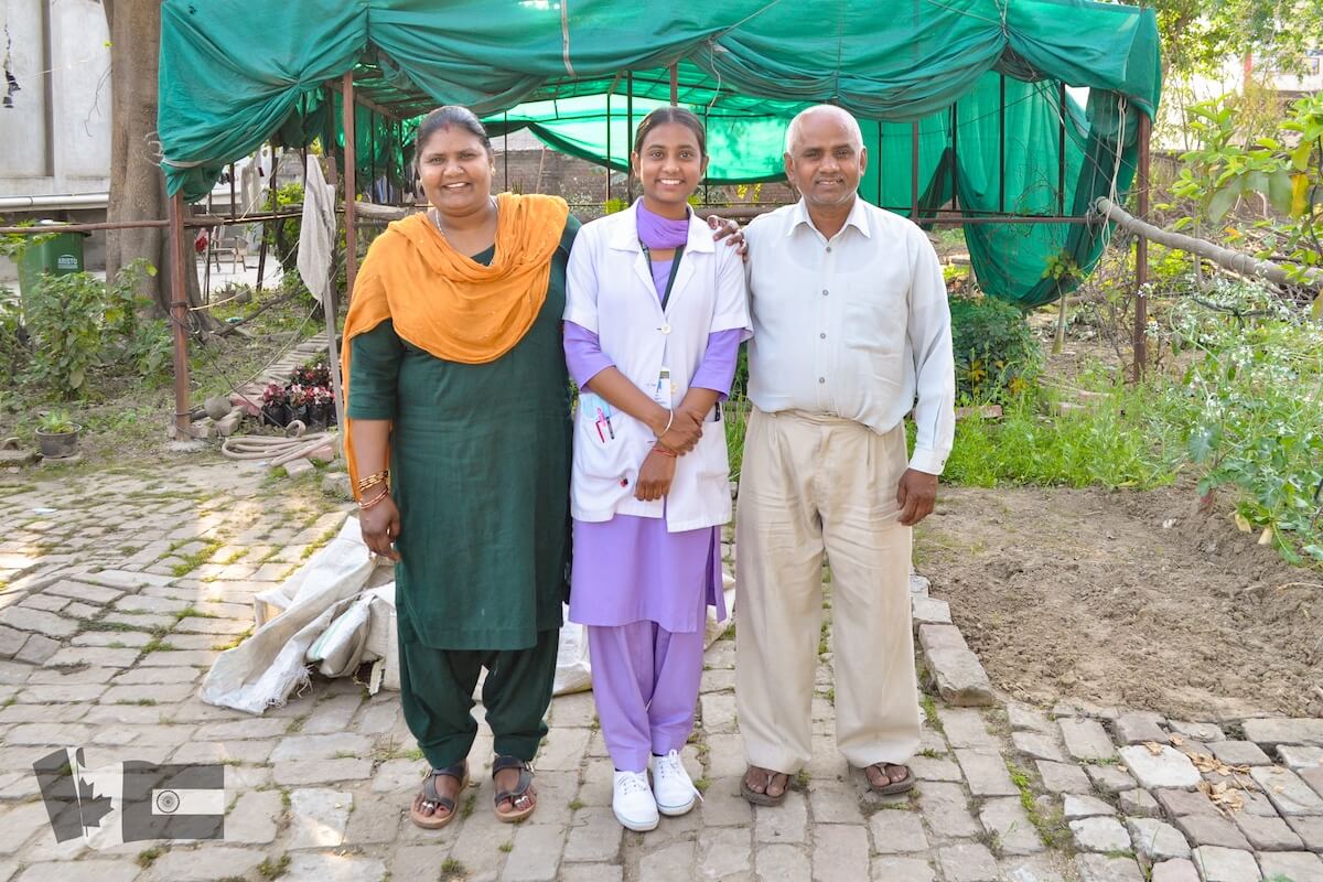 Raj Nandni - bursary recipient with parents