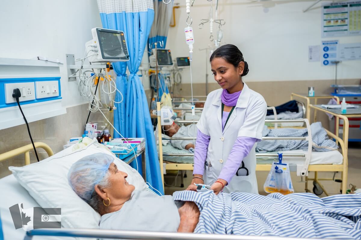 Raj Nandni - bursary recipient caring for patient during nursing practicum